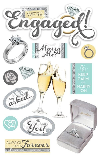 3D scrapbook stickers featuring engagement themed imagery with silver and blue details.
