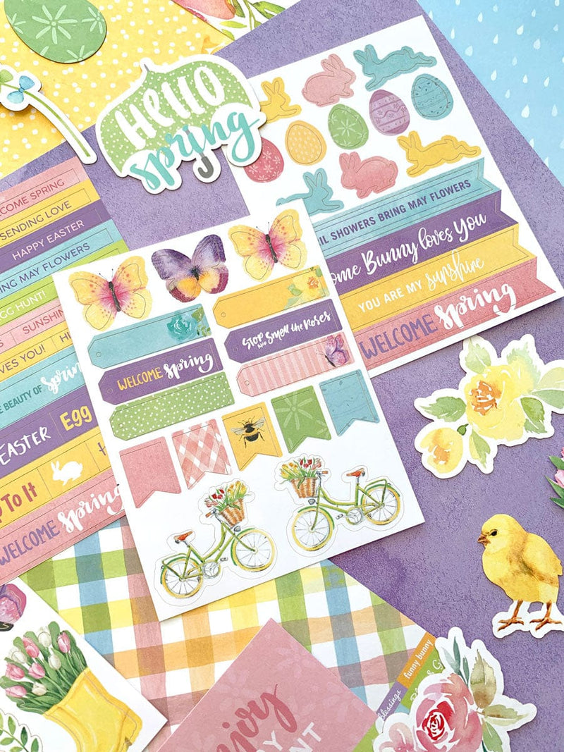 this craft kit image features close up of spring themed scrapbook papers and stickers