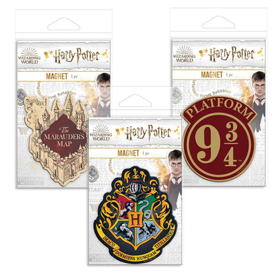 Three Harry Potter shaped magnets featuring the Hogwarts crest, the Marauder's Map and Platform 9 3/4 are shown in package on a white background.