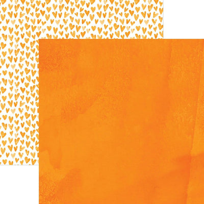 scrapbook paper image features an orange wash on front side and an orange heart pattern on back side.