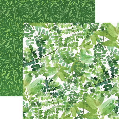 scrapbook paper image features large green leaves on front side and small green leaves on back side.