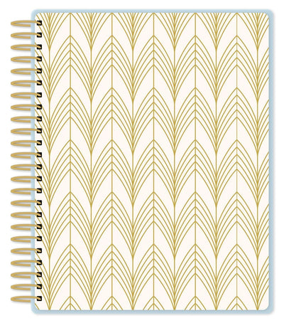 Art Deco weekly planner image shows cover featuring a gold line pattern on off-white background and gold coil spine.