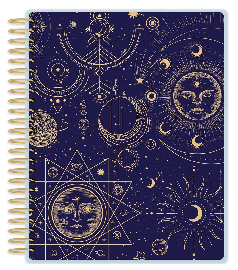 Celestial weekly planner image shows cover featuring gold line illustrations on solid blue background and gold coil spine.