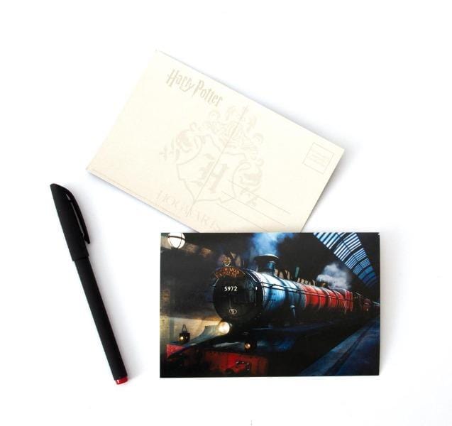 Harry Potter kids stationery set image featuring a photographic image of Hogwarts Express on a postcard with a black pen beside it.