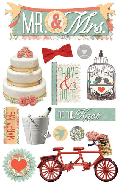 3D scrapbook stickers featuring a wedding cake, love birds and a bicycle for two.