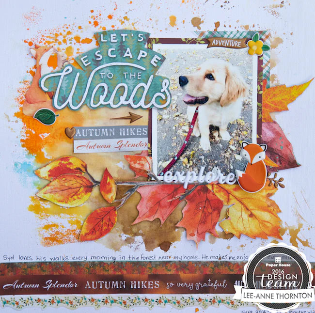 scrapbook layout featuring autumn leaves and a photo of a white dog.