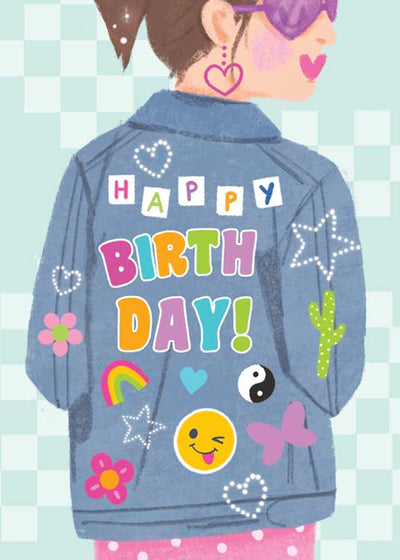 birthday note card featuring an illustration of a girl wearing a colorful jean jacket