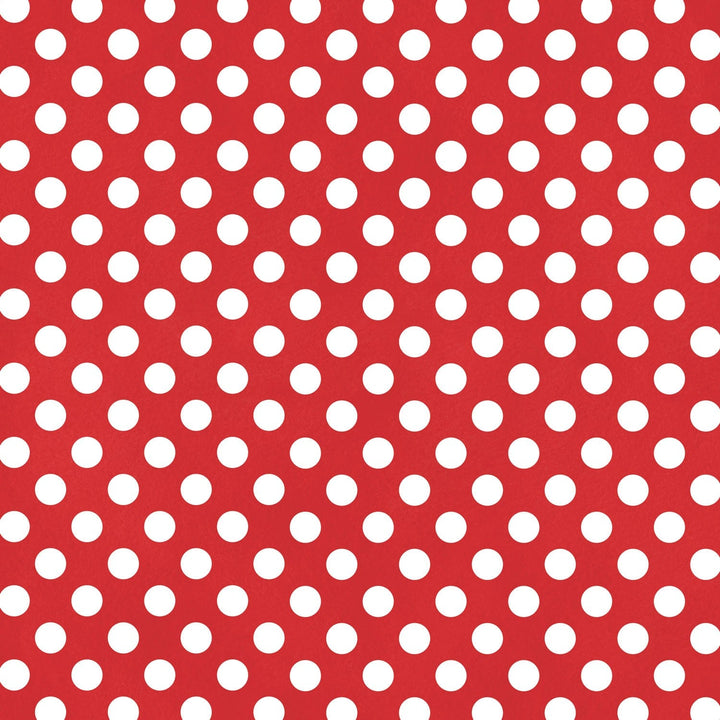 scrapbook paper featuring white polka dots on a red background.