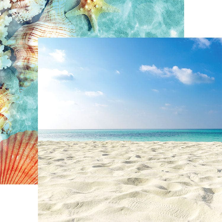 scrapbook paper featuring a photograph of white sandy beach and blue sky shown overlapping a close up of shells under the water.