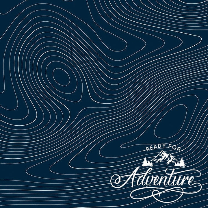 scrapbook paper featuring "Ready for Adventure" in lower right corner with a dark blue background with swirly white lines.