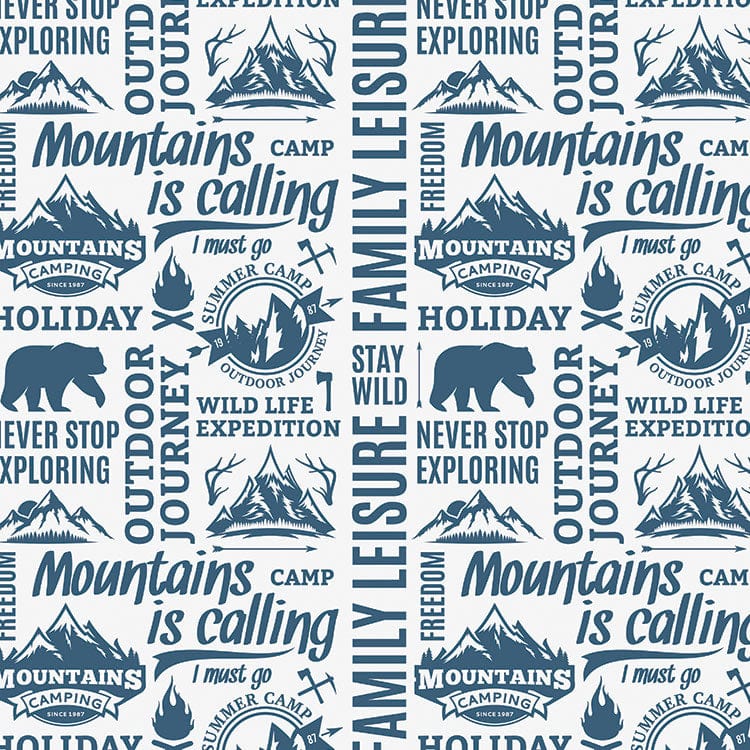 scrapbook paper featuring a pattern of blue words and illustrations of mountains and bears on a white background.