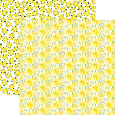 scrapbook paper featuring pattern of small yellow watercolor florals with green leaves on white background shown overlapping a pattern of small yellow flowers.