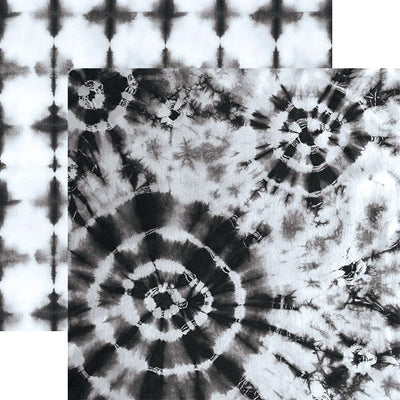 scrapbook paper featuring large circular black tie-dye pattern on a white background shown overlapping another black tie-dyed pattern.