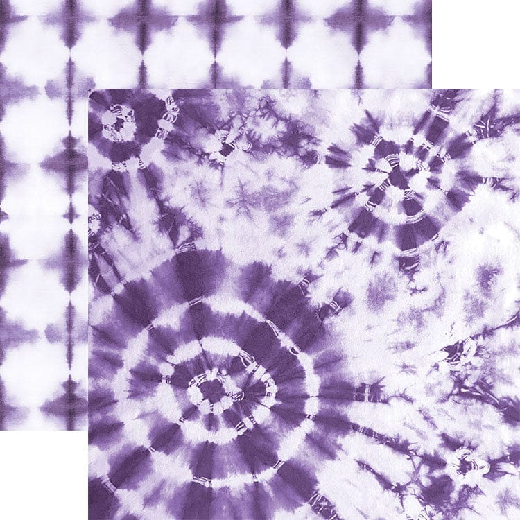 scrapbook paper featuring large circular purple tie-dye pattern on a white background shown overlapping a smaller pattern of purple tie-dye.