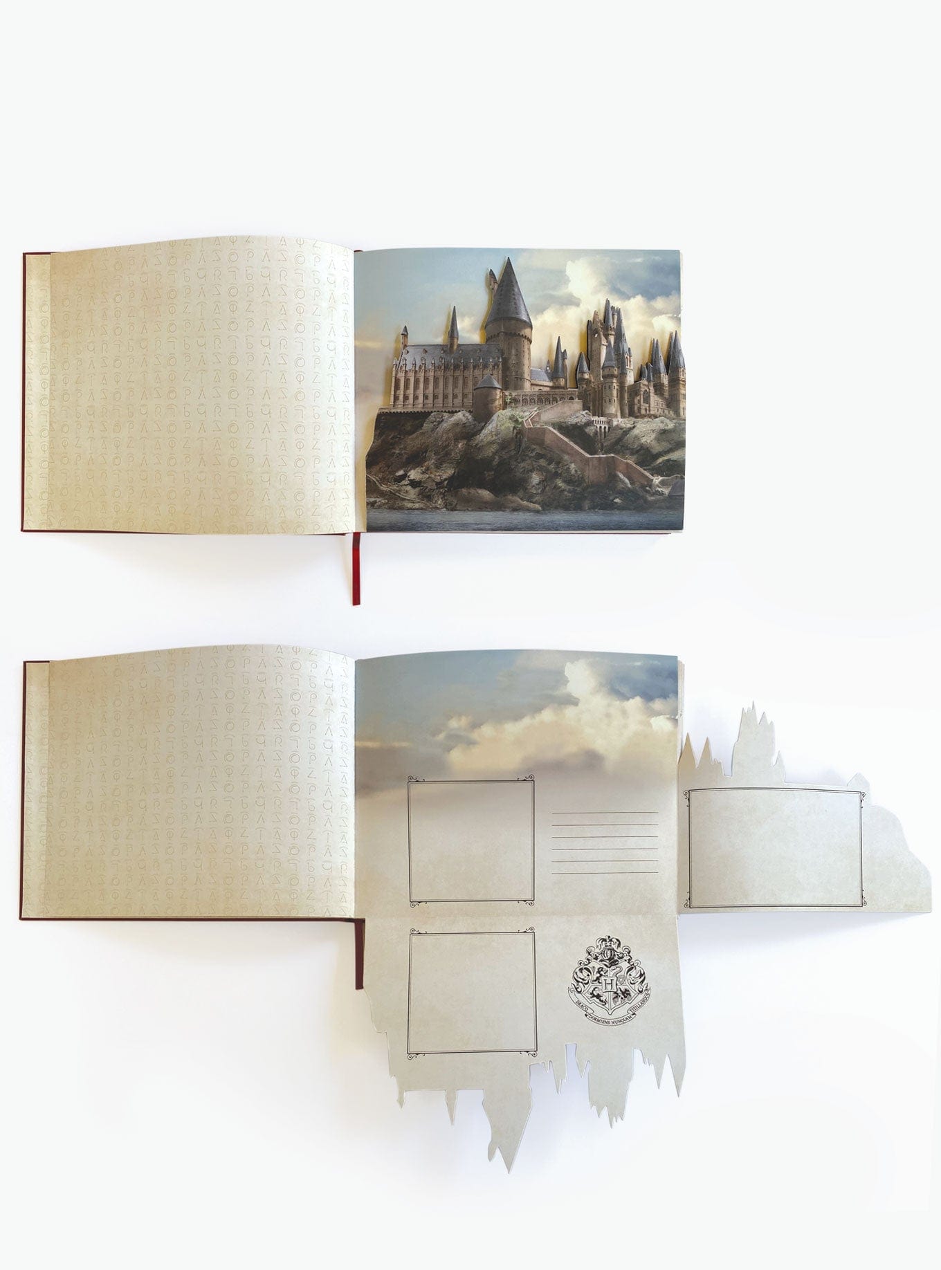 ALB-6000E - Harry Potter Vegan Leather Deluxe Flip Photo and Scrapbook Album - Opened vegan leather album displaying Hogwarts castle artwork and blank cream pages with decorative crest emblem