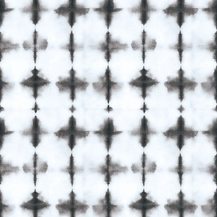 scrapbook paper featuring a black tie-dye pattern on a white background.