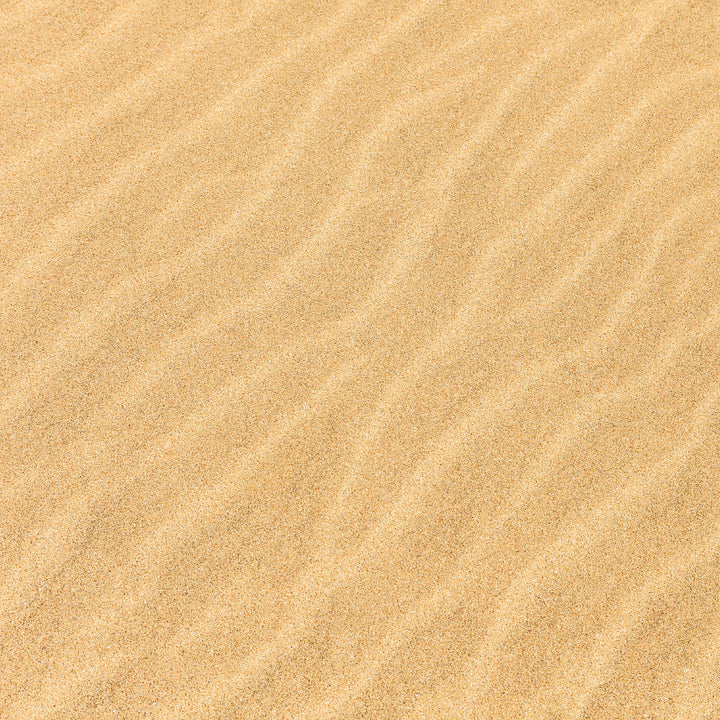 P-2422E - Beach Umbrella 12 x 12 Scrapbook Paper - Sandy beige textured background with diagonal wave patterns throughout