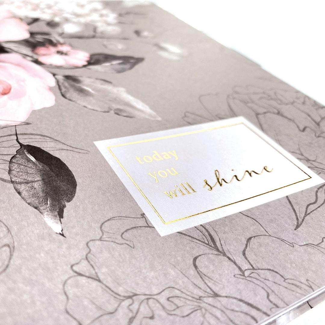 PL-2015E - Weekly Planner - Undated Soul Shine - Gray planner with pink flowers and gold-trimmed motivational sticker reading "today you will shine."