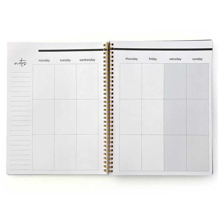 PL-2036E - Books &amp; Flowers 12 Month Undated Planner - Open spiral-bound weekly planner with gold binding, notes section, and seven-day grid layout in neutral tones