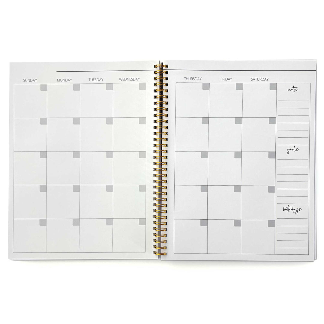 PL-2040E - Through the Keyhole 12 Month Undated Planner - Open spiral-bound weekly planner with gold binding, cream pages, and sections for notes, goals, and birthdays