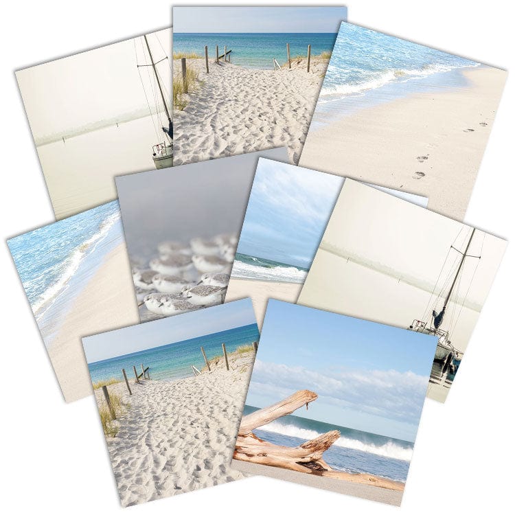 PSET-0012E - East Coast Beach 12 x 12 Scrapbook Paper Set - Collection of 12 beach-themed scrapbook papers featuring coastal scenes with sand, ocean, sailboats, and driftwood