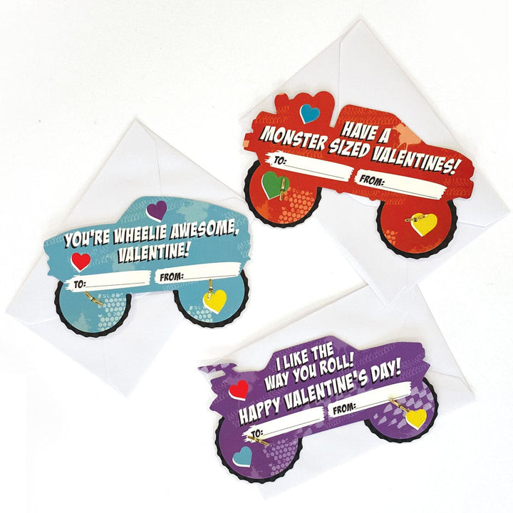 VPL-7020E - Valentine Cards Set - Monster Trucks - Three colorful monster truck-shaped valentine cards in blue, red, and purple with hearts and "To/From" fields