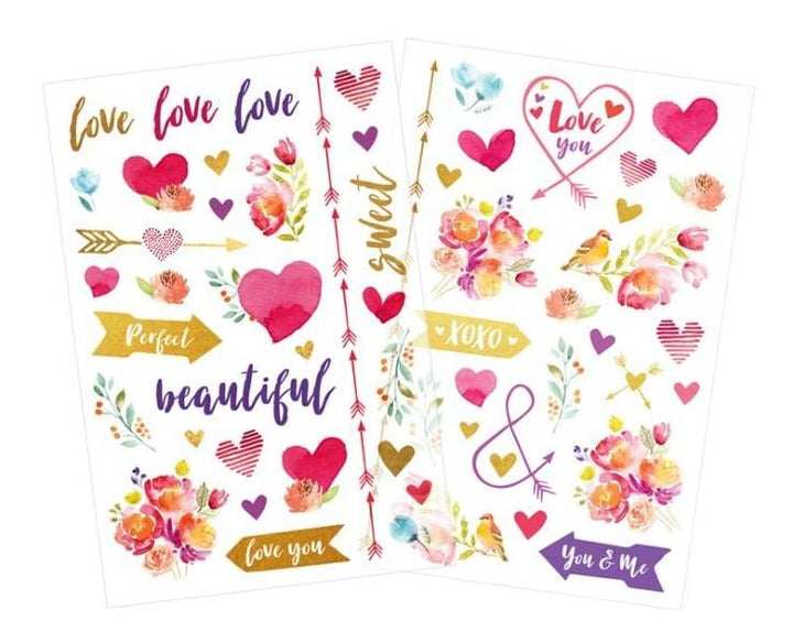 2 sheets of clear scrapbook stickers featuring watercolor hearts, flowers and arrows, shown on white background.