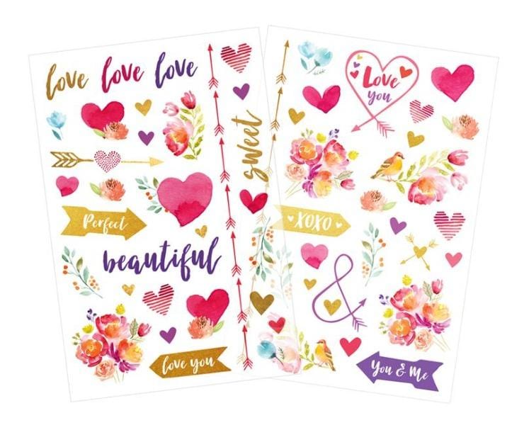 2 sheets of clear scrapbook stickers featuring watercolor hearts, flowers and arrows, shown on white background.