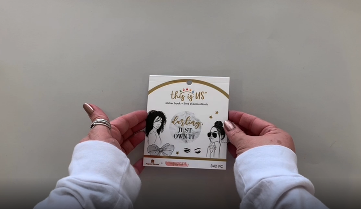 Female hands pick up and flip through the pages of this "Indy n Ivy Ink" planner stickers booklet to show each page of stickers in detail. There are twelve pages in this sticker book by Paper House Productions.
