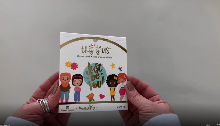 Female hands pick up and flip through the pages of this "Just be You" planner stickers booklet designed by Mommy Lley to show each page of stickers in detail. There are twelve pages in this sticker book by Paper House Productions.
