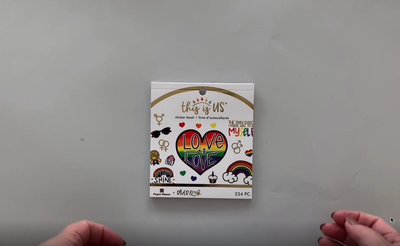 Female hands pick up and flip through the pages of this Love is Love "River & Ink" planner stickers booklet to show each page of stickers in detail. There are twelve pages in this sticker book by Paper House Productions.