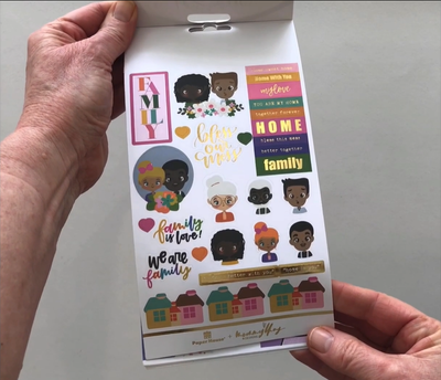 Female hands pick up and flip through the pages of the "Mommy Lhey Family Is Love" planner stickers booklet to show each page of stickers in detail. There are four pages in this sticker book by Paper House Productions.