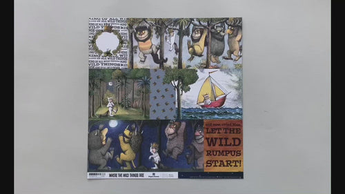 Female hands pick up scrapbook paper featuring Where the Wild Things Are tags on one side and a pattern of stars on the other side.
