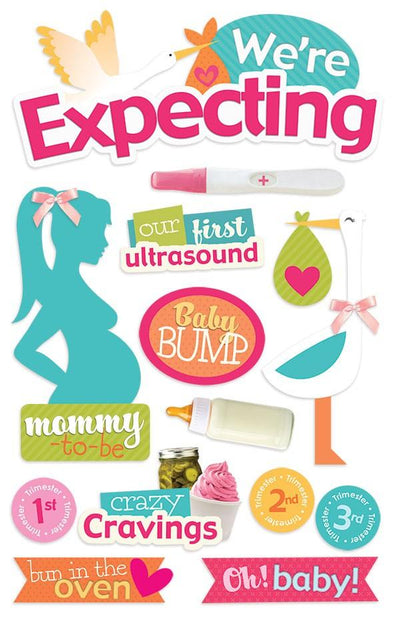 3D scrapbook stickers featuring teal and pink illustrations of pregnant woman, pregnancy test and baby bottle.
