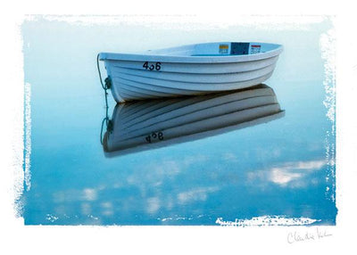 note card featuring a photograph of a skiff on the water in tones of blue.