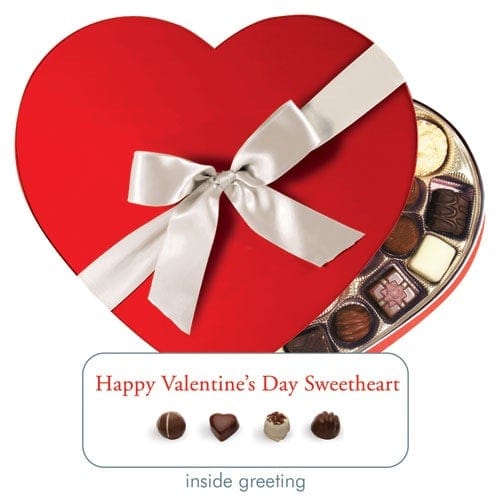 note card featuring a die cut, photo real, partially opened red box of chocolates with a white satin bow, shown with a close up of the inside greeting, shown on white background.