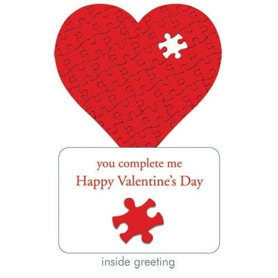 note card featuring a die cut, shaped red heart with a puzzle piece missing, shown with a close up of the inside Valentine's Day greeting, shown on white background.