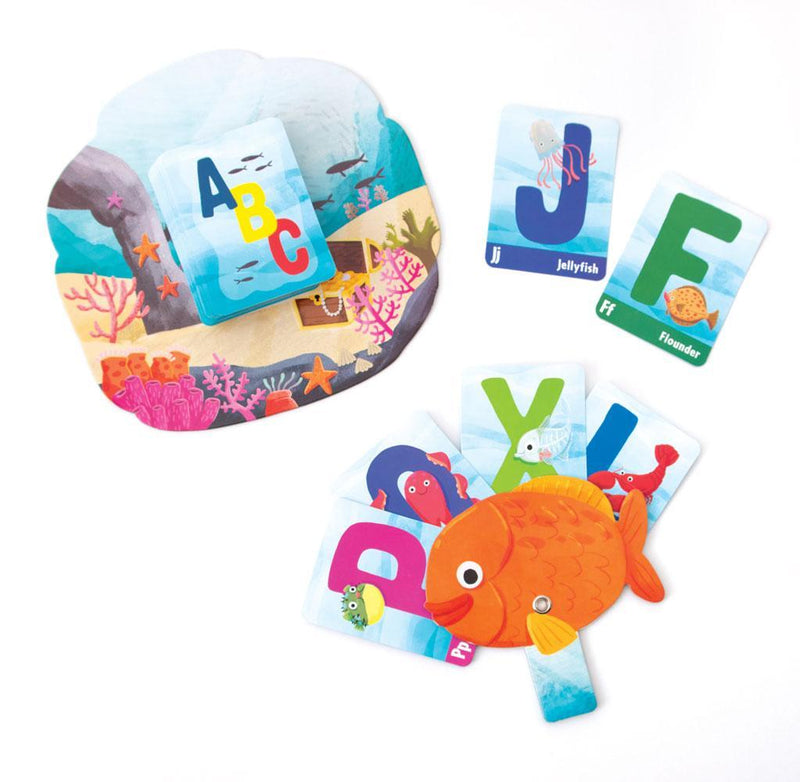 A-B-Seas go fish card game image of kids card game pieces with illustrations of  jellyfish, flounder, and puffer fish in a gold fish card holder.