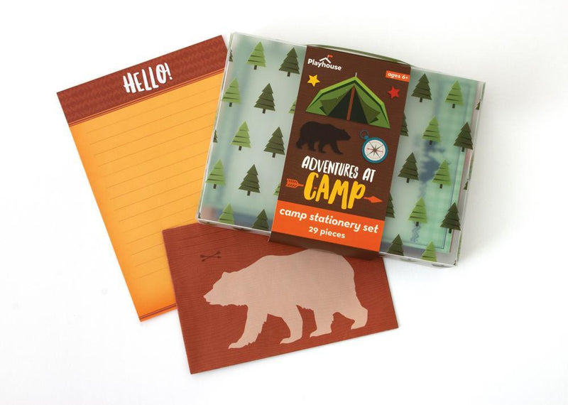 Adventures at Camp kids stationery  image shows tote package and note paper with envelope featuring illustrations of a bear, trees, and an outdoor tent.