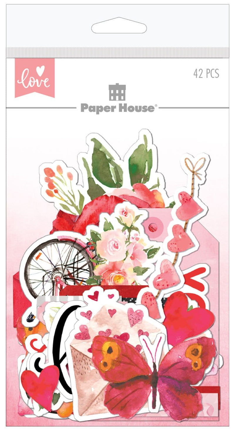 An assortment of scrapbook die cuts shown in package, featuring illustrated pink florals, butterflies and hearts.