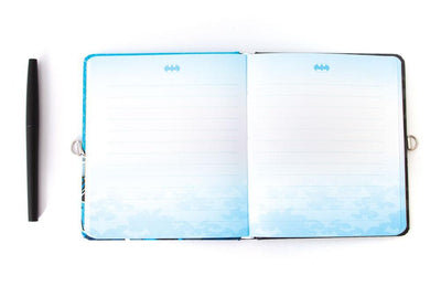 Batman locking diary shown open featuring light blue lined pages and a black pen.