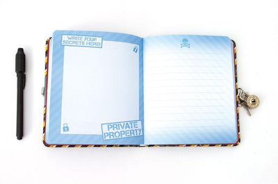 Keep Out Invisible Ink locking diary shown open featuring a blue lined page and a blue bordered blank page with black pen.