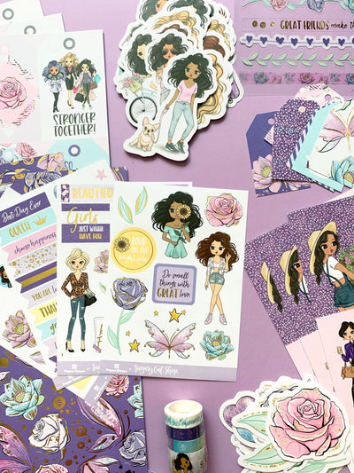 Papers, stickers and washi tape, featuring ethnically diverse women shown against a purple background.  