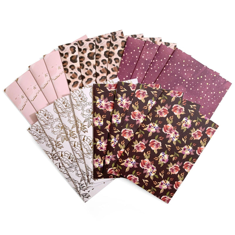 craft kit containing four each of five patterned, paper folded cards. Gold foil floral on white, multi-color florals on black, brown/black cheetah pattern, pink dots on burgundy background and solid pink with gold foil detail.