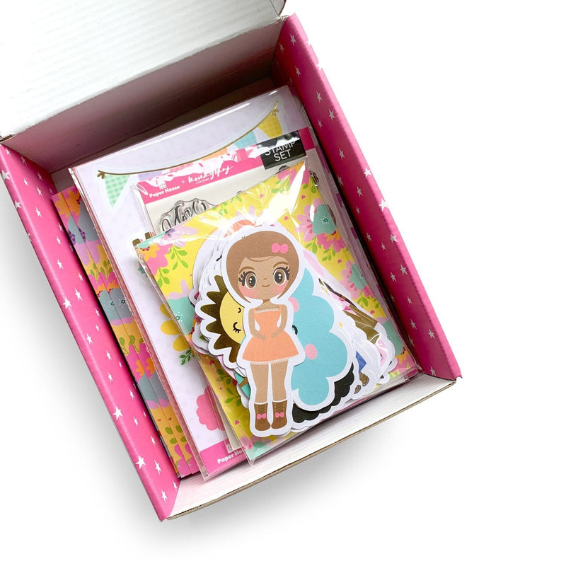 birds-eye-view of Mommy Lhey card making kit box shown open with kit contents neatly stacked