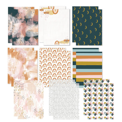 Nine craft kit papers, overlapping duplicate papers are shown on a white background featuring navy, gold and pink patterns.