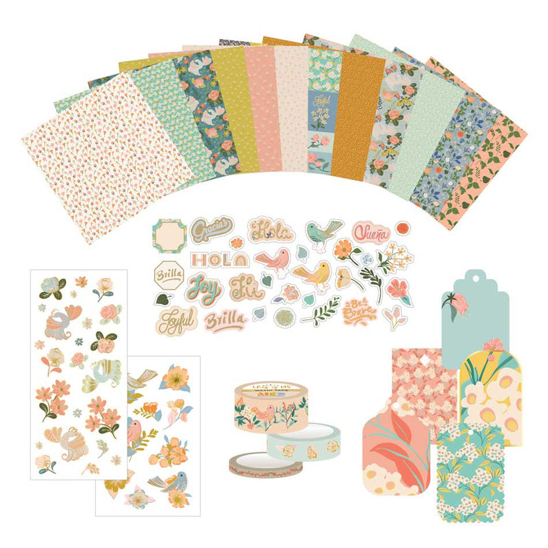 Craft kit featuring an assortment of fanned out illustrated floral papers, stickers, die cuts, washi tape and tags shown on white background.