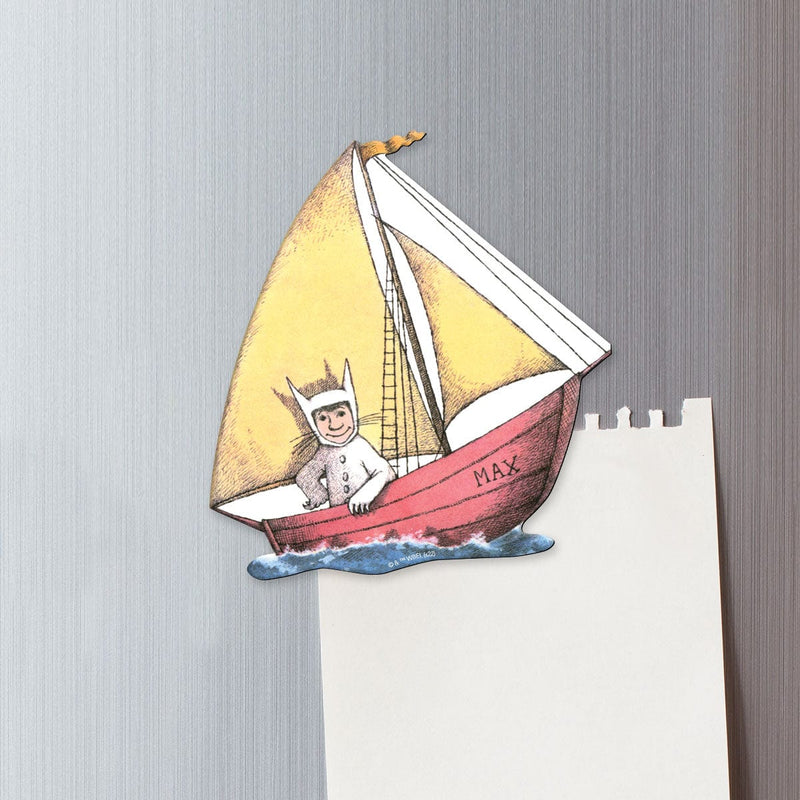fridge magnet featuring Max in his sailboat shown on metal background attached to a torn sheet of white memo paper.