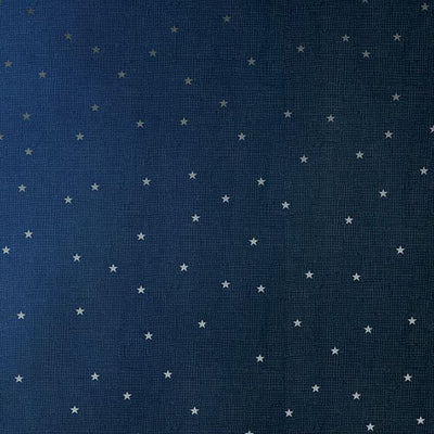 scrapbook paper featuring a star pattern on dark blue background.