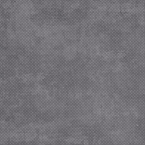 scrapbook paper featuring a gray background covered with white mini polka dots.